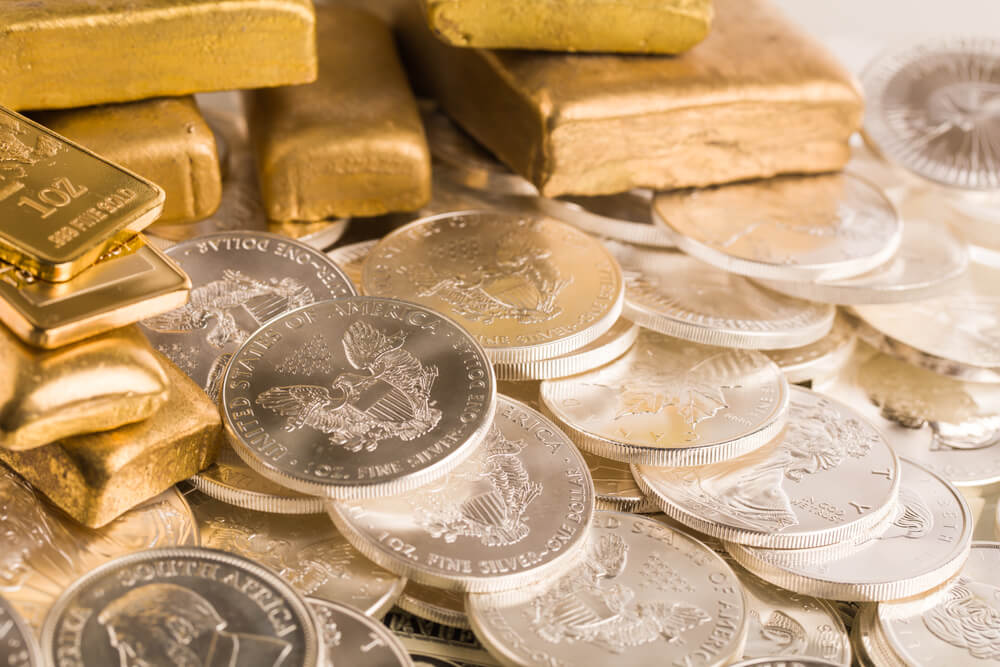 Gold and silver crash as investors exit historic highs